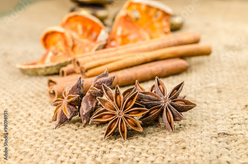 Fototapeta Naklejka Na Ścianę i Meble -  Star anise and cinnamon spicy on sackcloth