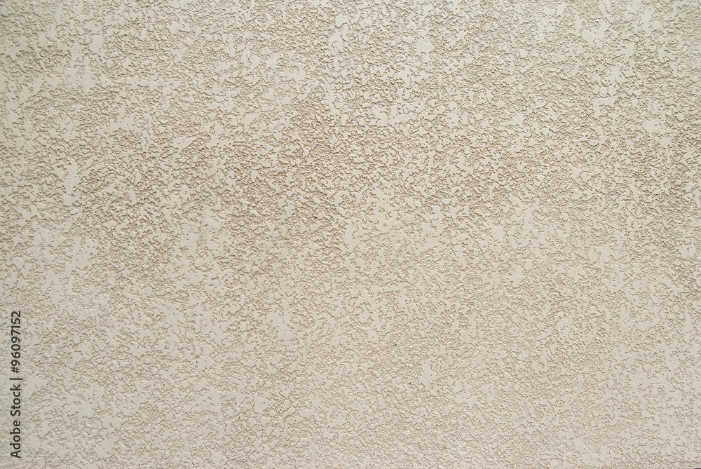 Fototapeta premium Decorative plaster wall with yellow structure as texture