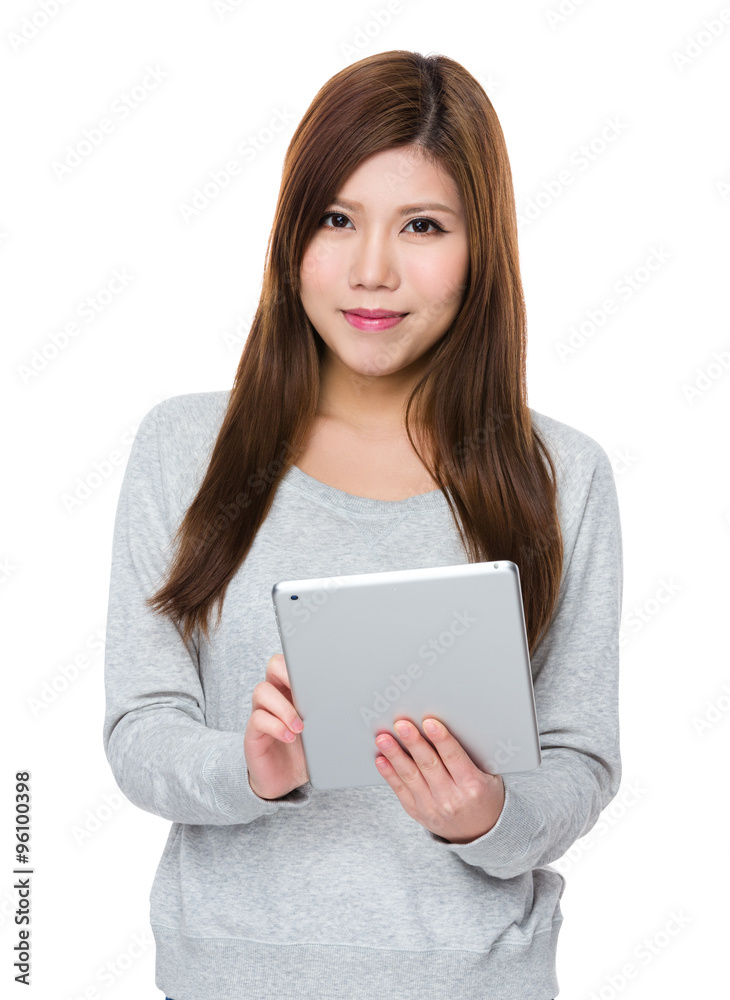 Asian Young Woman use of the tablet computer Asian Young Woman use of the tablet computer