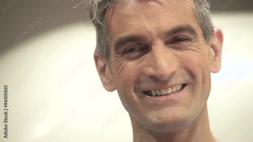 Man looking at camera and smiling Man looking at camera and smiling