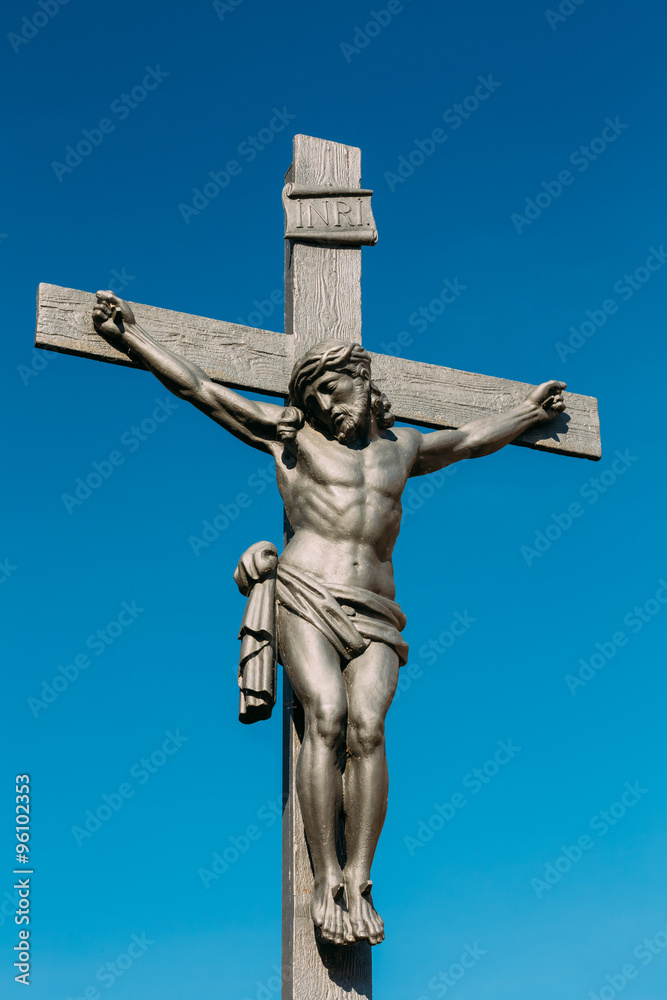 Statue of the Christian cross with Jesus in Cesky Krumlov, Czech Statue of the Christian cross with Jesus in Cesky Krumlov, Czech
