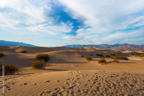 Sand dunes of the Death Valley in evening shadows