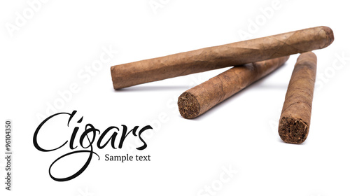 Three cigars on white photo