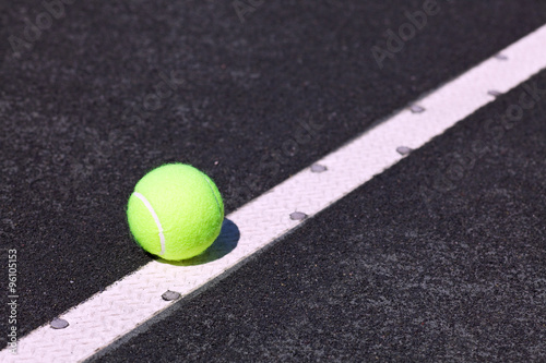 tennis ball on serve line