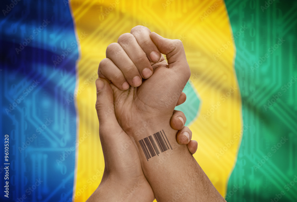Barcode ID number on wrist of dark skinned person and national flag on background - Saint Vincent and the Grenadines