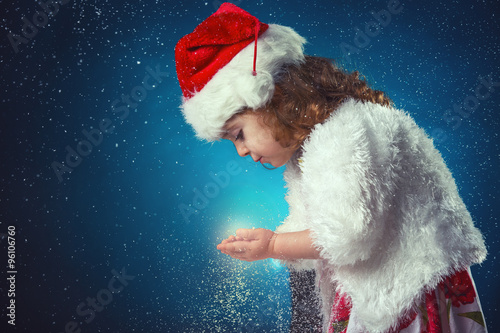 winter, holidays, christmas concept - beautiful little girl havi