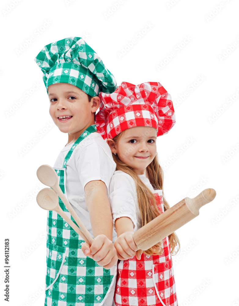 Happy chefs with wooden utensils Happy chefs with wooden utensils