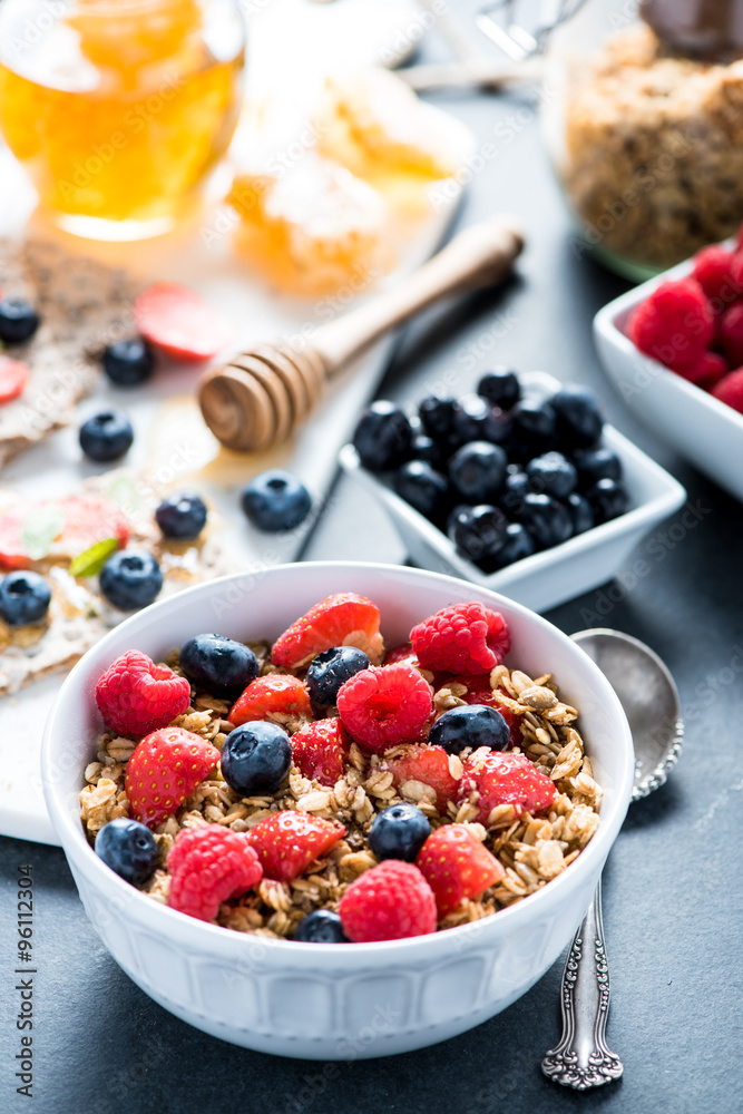 Bowl with granole and berries Bowl with granole and berries