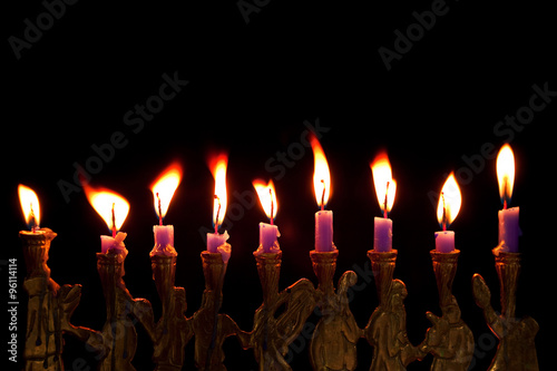 hanukkah candles on black background
