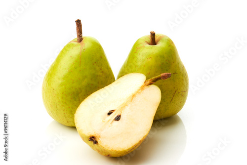 Two green pears and half