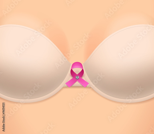 Woman's breast dressed in bra, and pink ribbon