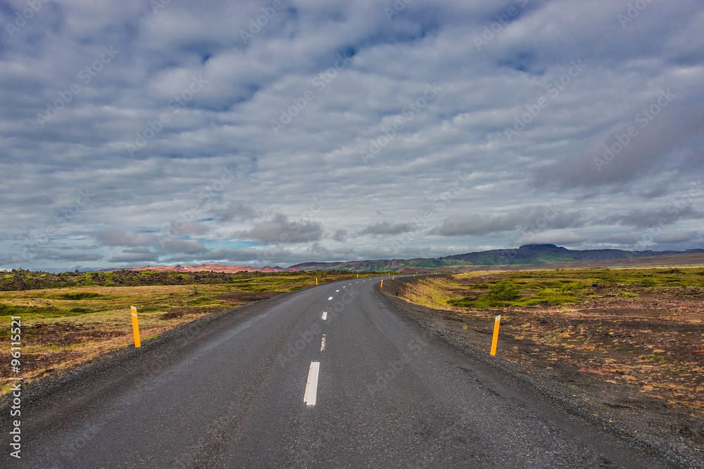 Isolated road and Icelandic landscape at Iceland, summer time