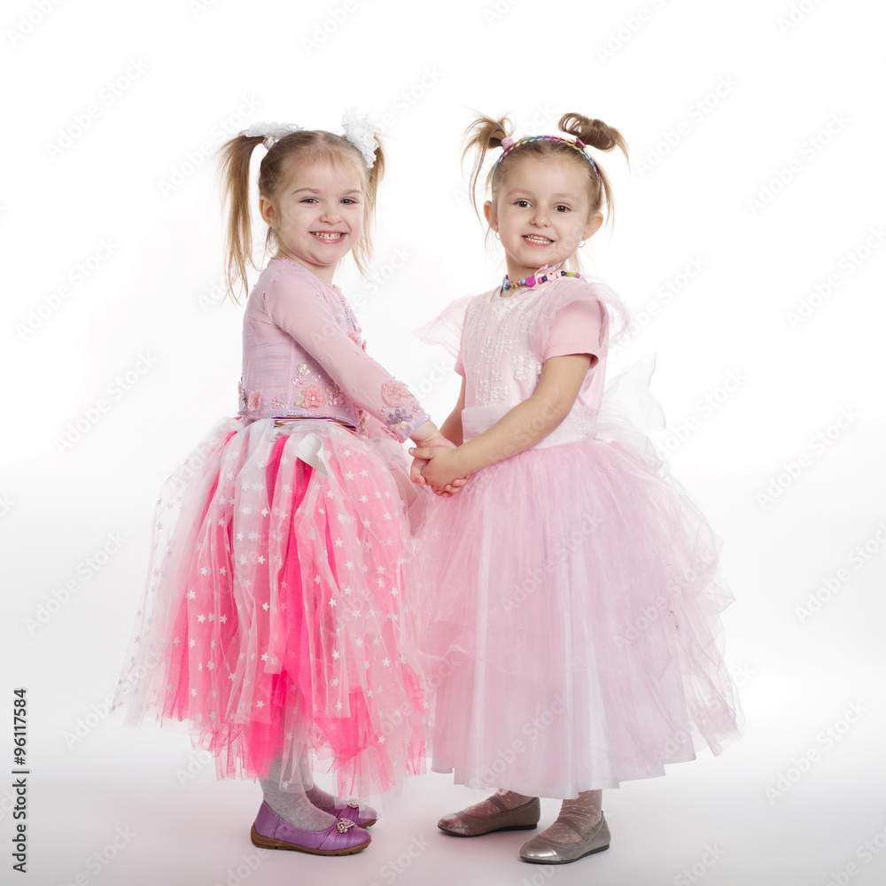 Two little girls - best friends on white Two little girls - best friends on white