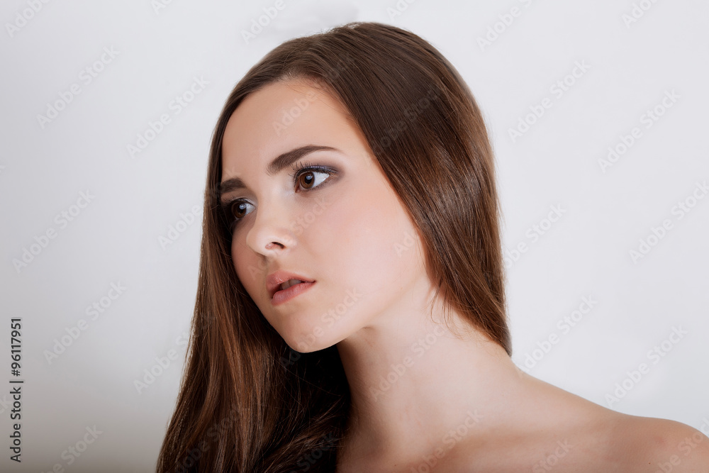 Woman face with hair motion on white background isolated close u Woman face with hair motion on white background isolated close u