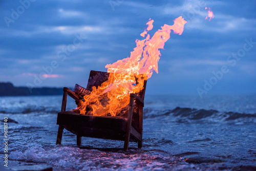 Burning old armchair