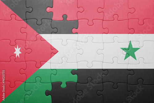 puzzle with the national flag of syria and jordan