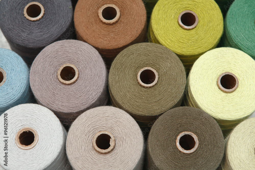 Color sewing threads as a background close up Color sewing threads as a background close up