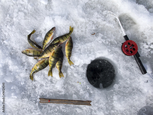 Ice fishing, equipment and catch