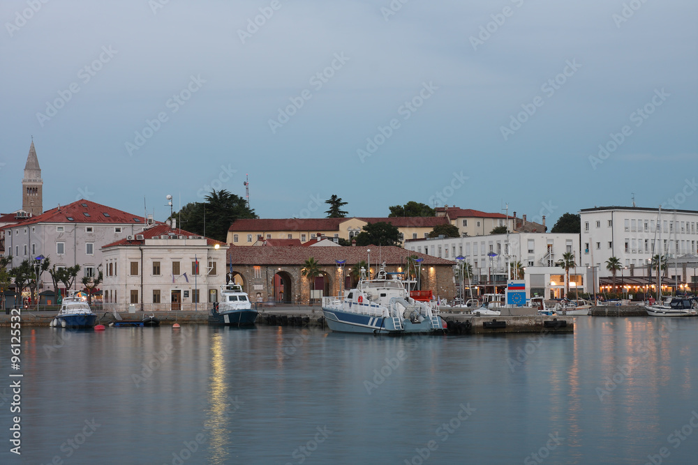 Police  boats moored in harbor in Koper after sunset time