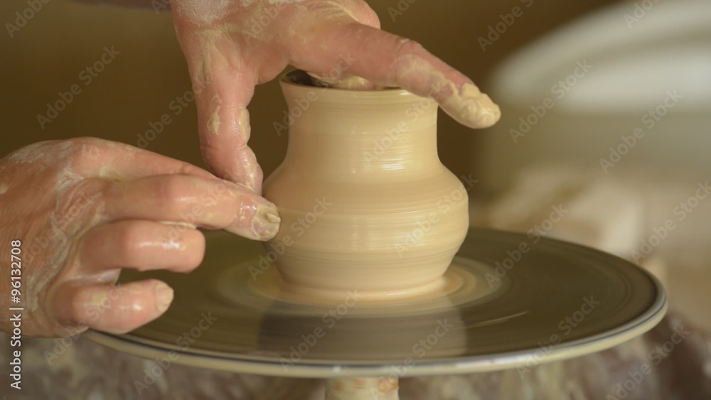 Making a clay pottery jug on a pottery wheel.
Camera shooting with a preset for high-quality postprocessing Making a clay pottery jug on a pottery wheel.
Camera shooting with a preset for high-quality postprocessing