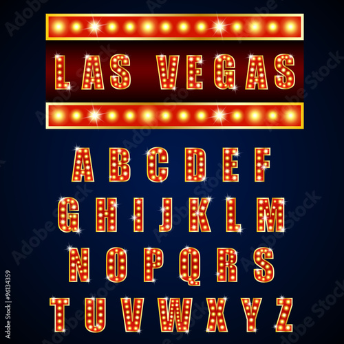 Alphabets lamp of light neon of gold  on blue background 