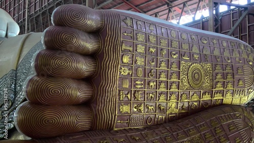 Chauk htat gyi reclining buddha (sweet eye buddha) in yangon, myanmar