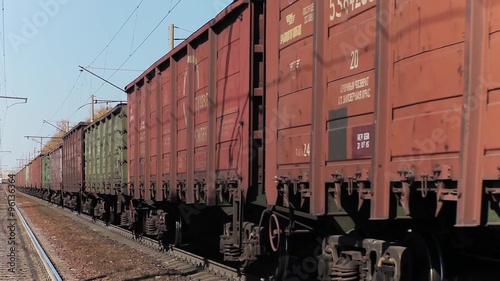 Freight train with cargo containers passing by