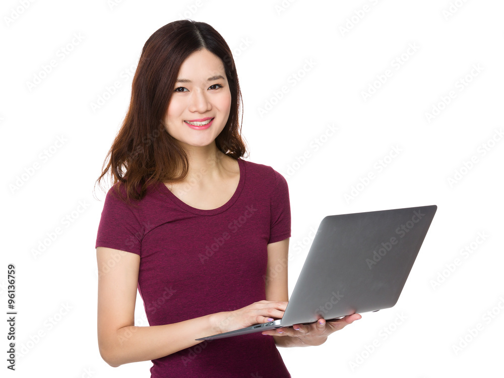 Young Woman use of the notebook computer Young Woman use of the notebook computer