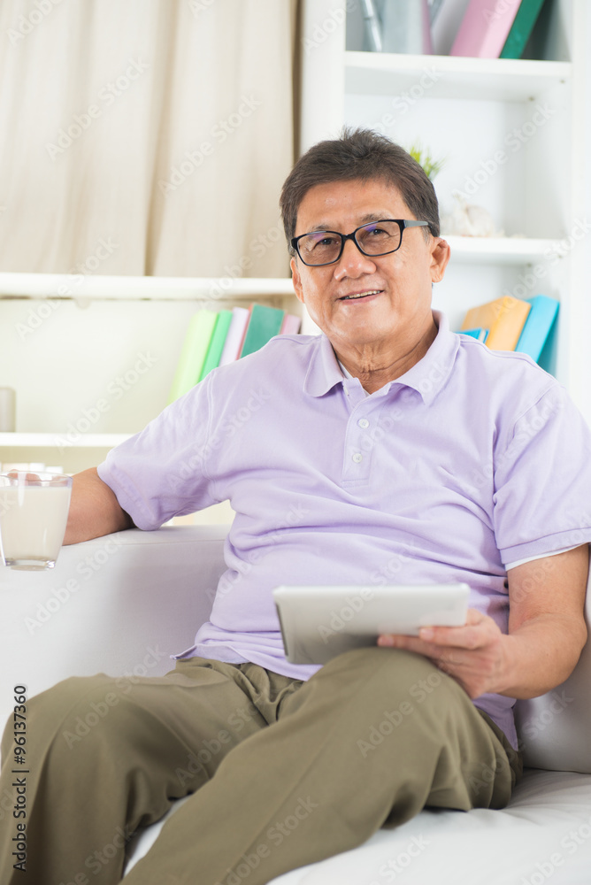 asian Senior Man Reading With Drink At Home asian Senior Man Reading With Drink At Home