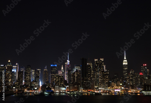 Manhattan Skyline over Hudson River at night