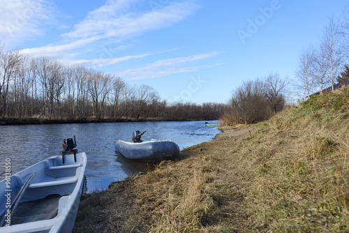 Boat on the shore of a mountain river.
National Nanai boat on the shore of a mountain river. photo