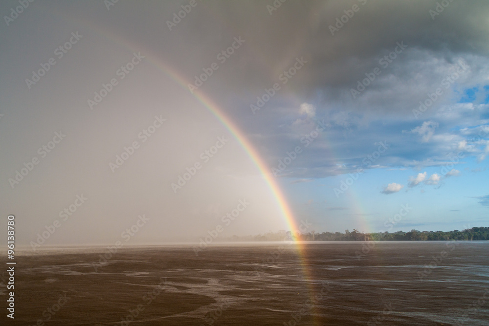Rainbow over river Amazon in Brazil