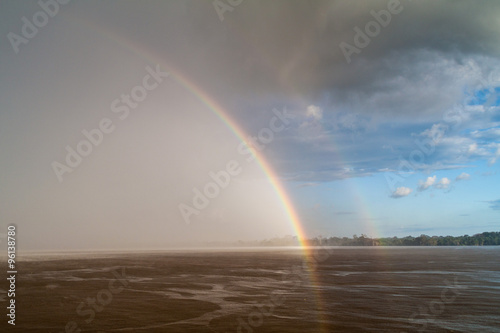 Rainbow over river Amazon in Brazil