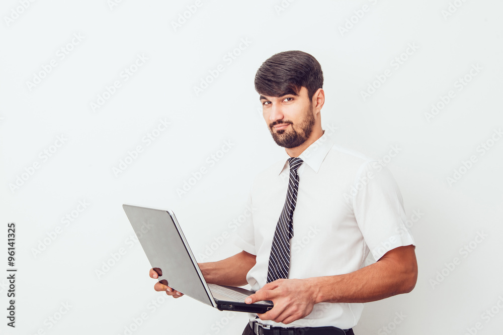 Portrait of an handsome businessman with a laptop Portrait of an handsome businessman with a laptop