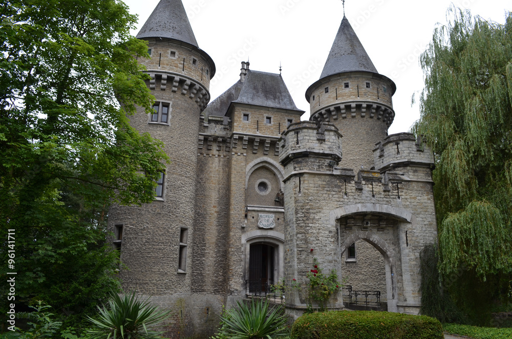 Entrance road to castle in park in Bonheiden, Belgium