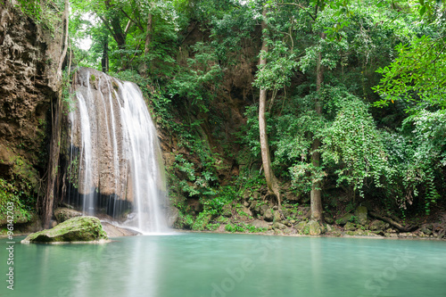 Fototapeta Naklejka Na Ścianę i Meble -  Deep forest waterfall at Erawan waterfall National Park Kanchana