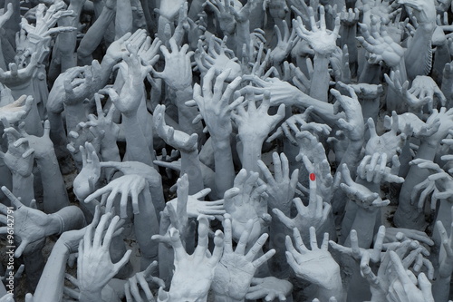 Pleading Hands Rise Up from Hell a park of Wat Rong Khun in the northern part of Thailand