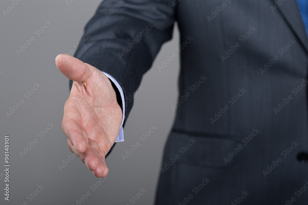 Businessman offering his hand for handshake