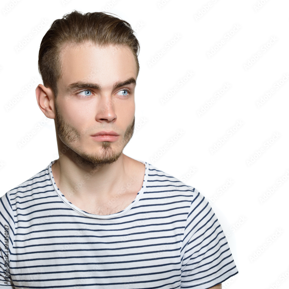 Portrait of attractive young man over white background.