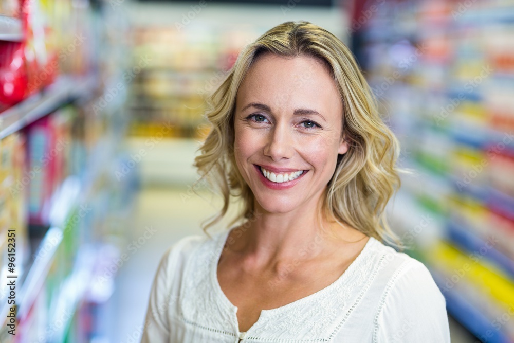 Smiling woman at the supermarket Smiling woman at the supermarket