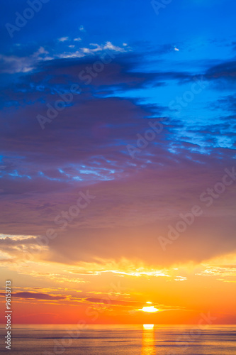 Fototapeta Naklejka Na Ścianę i Meble -  Beautiful colorful sunset over mediterranean sea is reflected in
