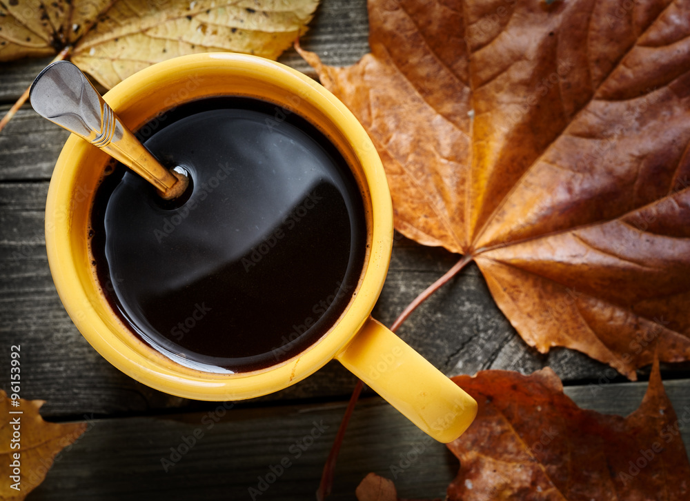 Coffee and autumn leaves