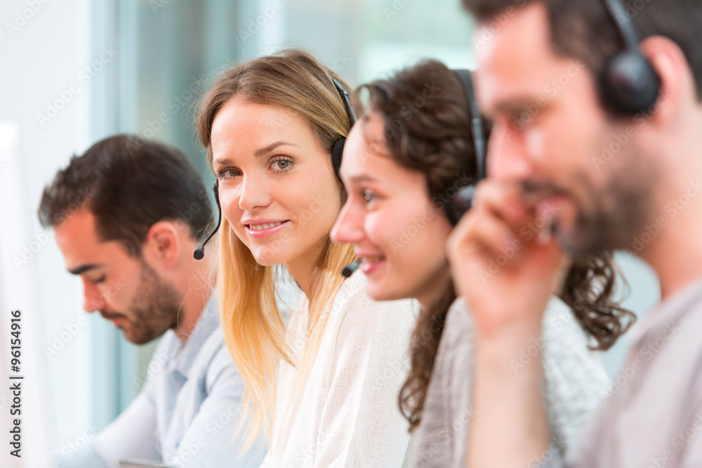 Young attractive woman working in a call center Young attractive woman working in a call center