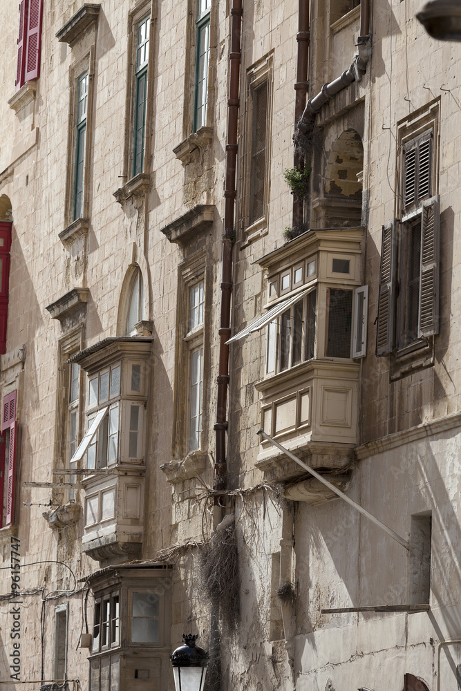Typical maltese balconies in historical district of capital of Malta, Valletta, Europe