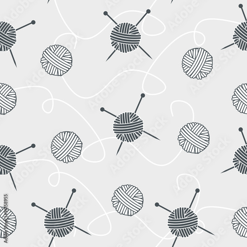 seamless background balls of yarn and knitting needles