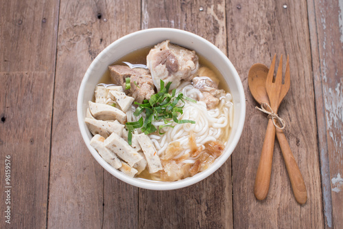 Vietnamese Noodle Soup with  wooden spoons
