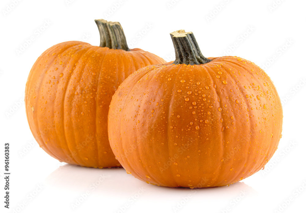 Obraz premium Closeup shot of beaded pumpkins isolated on white