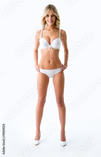 Slim girl in gold bikini