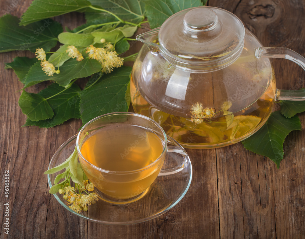 teapot and cup with linden tea teapot and cup with linden tea