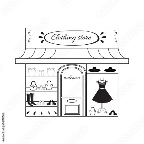 Storefront with a lot of different elements - woman dress, shoes, hat, bag